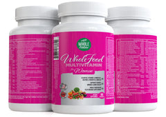Whole Nature Women's Multi bottle beside glass suggesting prenatal-style nutrition.