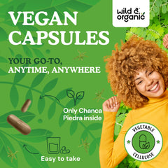 Wild & Organic capsules being poured for a simple daily kidney and gallbladder support routine.