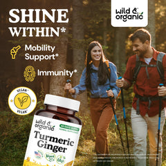 Wild & Organic turmeric ginger capsules close-up, vegan and non-GMO.