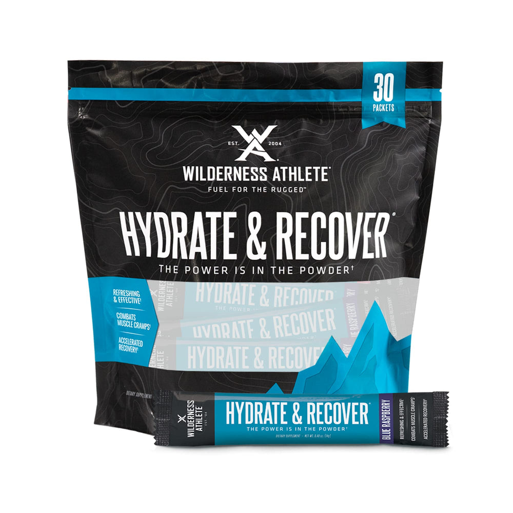 Wilderness Athlete Hydrate & Recover blue raspberry packets ready for hydration during workouts.