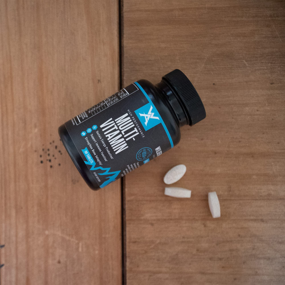 Wilderness Athlete multivitamin label closeup highlighting essential vitamins and minerals.