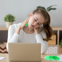 Woanger Boo Boo Ice Pack round green remains flexible when cold.