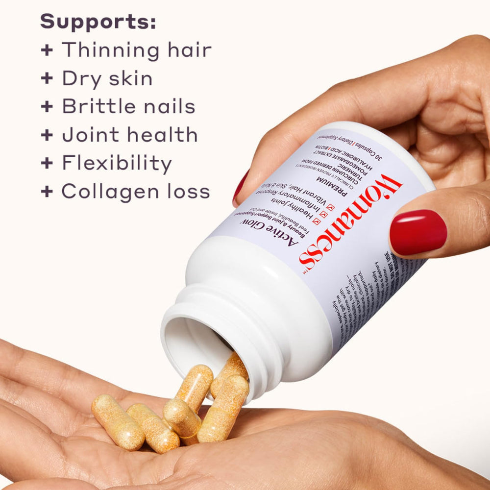 Womaness Active Glow capsules closeup dosed image showing precise daily servings