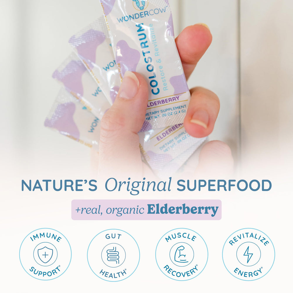 Dissolving WonderCow colostrum sachet in water for a smooth mix