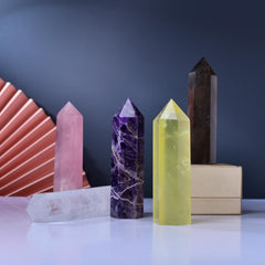 WUYOUSHI quartz wand amplifying energy around other stones