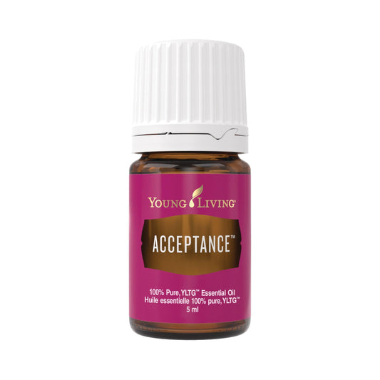 Young Living Acceptance 5ml bottle beside diffuser for calming meditation.