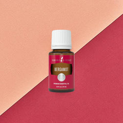 Young Living Bergamot oil diffusing in a diffuser to create a calming ambiance.