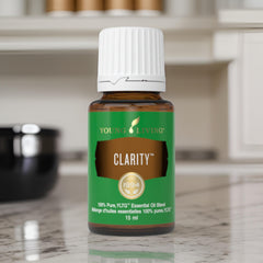 Young Living Clarity bottle beside V-6 carrier oil for dilution.