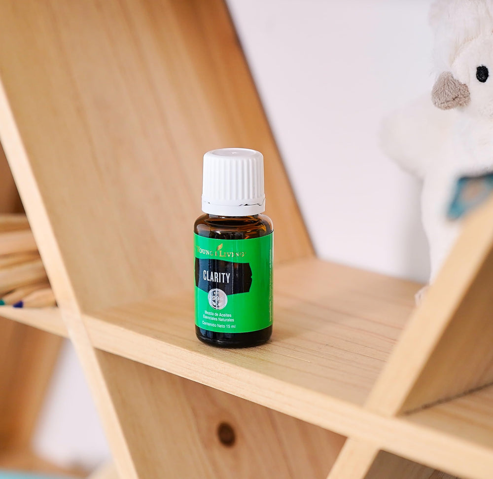 Young Living Clarity topical application on skin with carrier oil.
