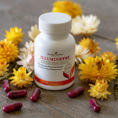 Young Living IlluminEyes daily-use scene on a desk with natural lighting.