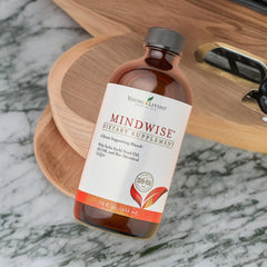 Close-up MindWise label shows Vitamin D3 and ALCR ingredients.