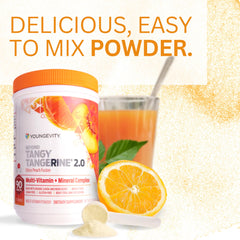 Youngevity Beyond Tangy Tangerine 2.0 mix-in glass showcases straw-ready drink.