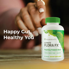 Youngevity Ultimate Flora FX capsules in hand, ready for daily ritual.
