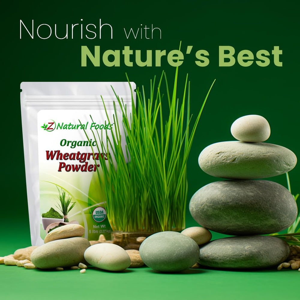Z Natural Foods wheatgrass powder with scoop beside blender for smoothies
