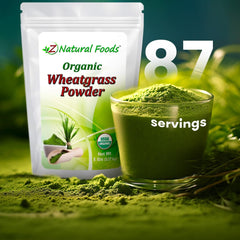Z Natural Foods wheatgrass powder on a cutting board with fresh greens