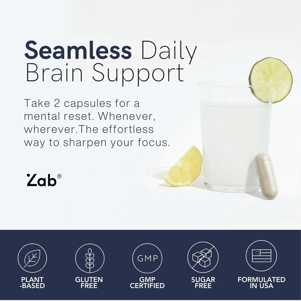 Array of capsules ready for daily use beside a glass of water.