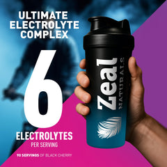 Glass with Zeal Electrolyte Powder black cherry drink after a workout