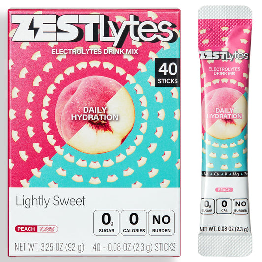 ZestLytes Peach electrolyte packets dissolving in water for refreshing hydration.