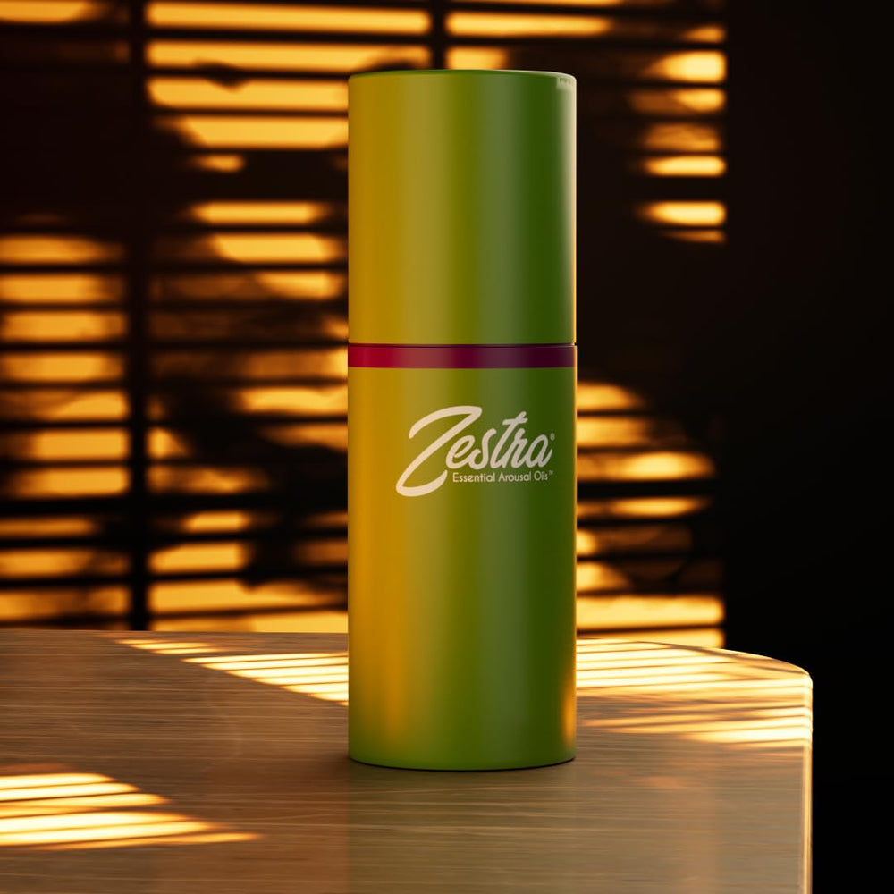Zestra Essential Arousal Oil dropper close-up showing precise application for quick activation.