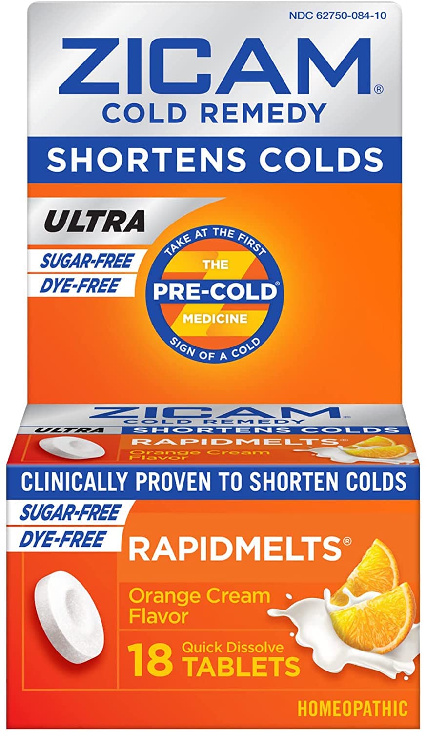 Zicam orange-cream rapidmelts bottle beside a glass of water