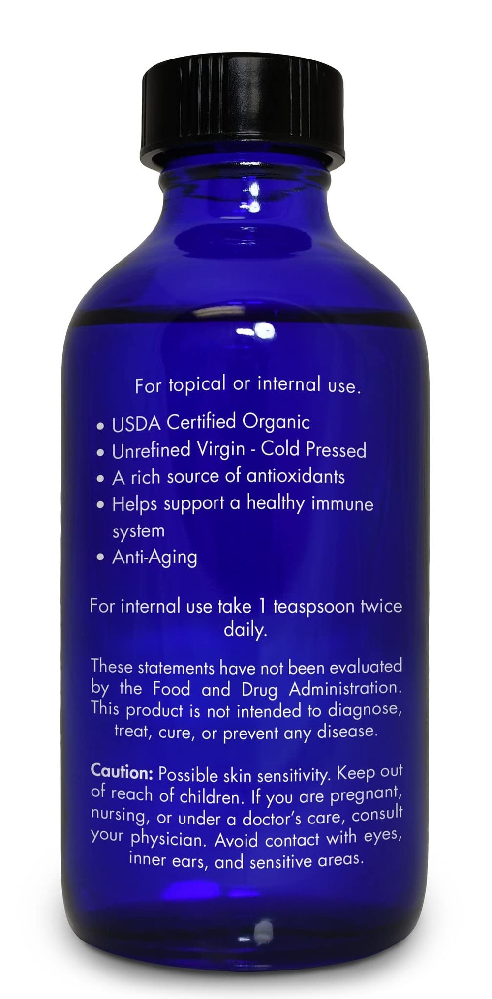Zongle Therapeutics label close-up emphasizes organic, non-GMO quality for skin and hair care.