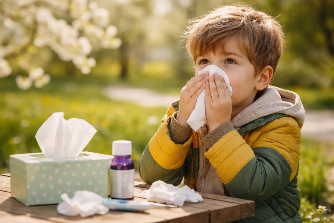 Child outdoors in spring with watery eyes and tissues