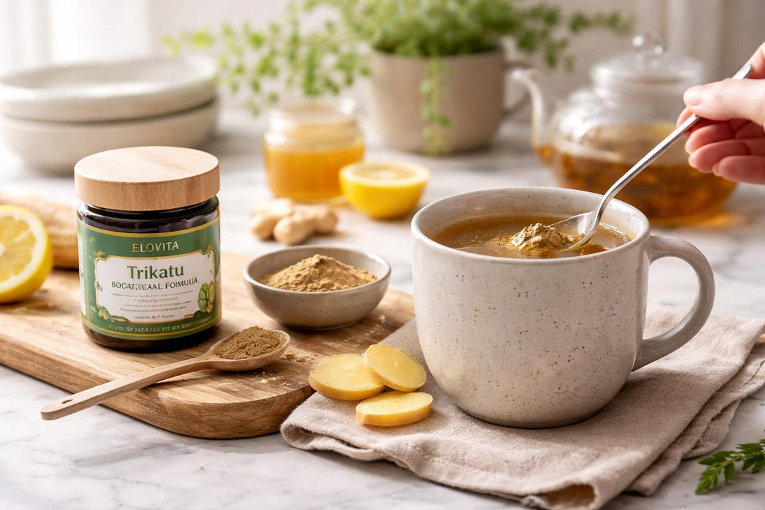 Trikatu mixed into warm herbal drink in a mug