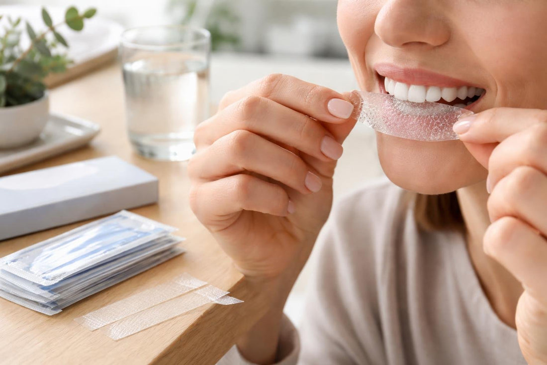 Close up of whitening strips being applied