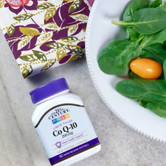 Pouring 21st Century CoQ10 softgels showing easy daily use