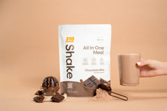 310 Nutrition shake poured into a glass with rich chocolate flavor