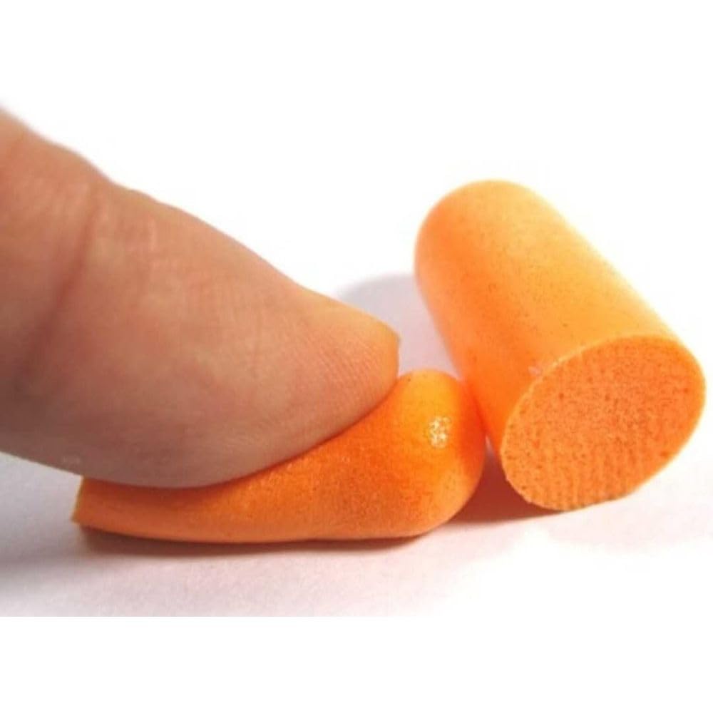 3M 1100 earplugs inserted in-ear showing a comfortable seal.