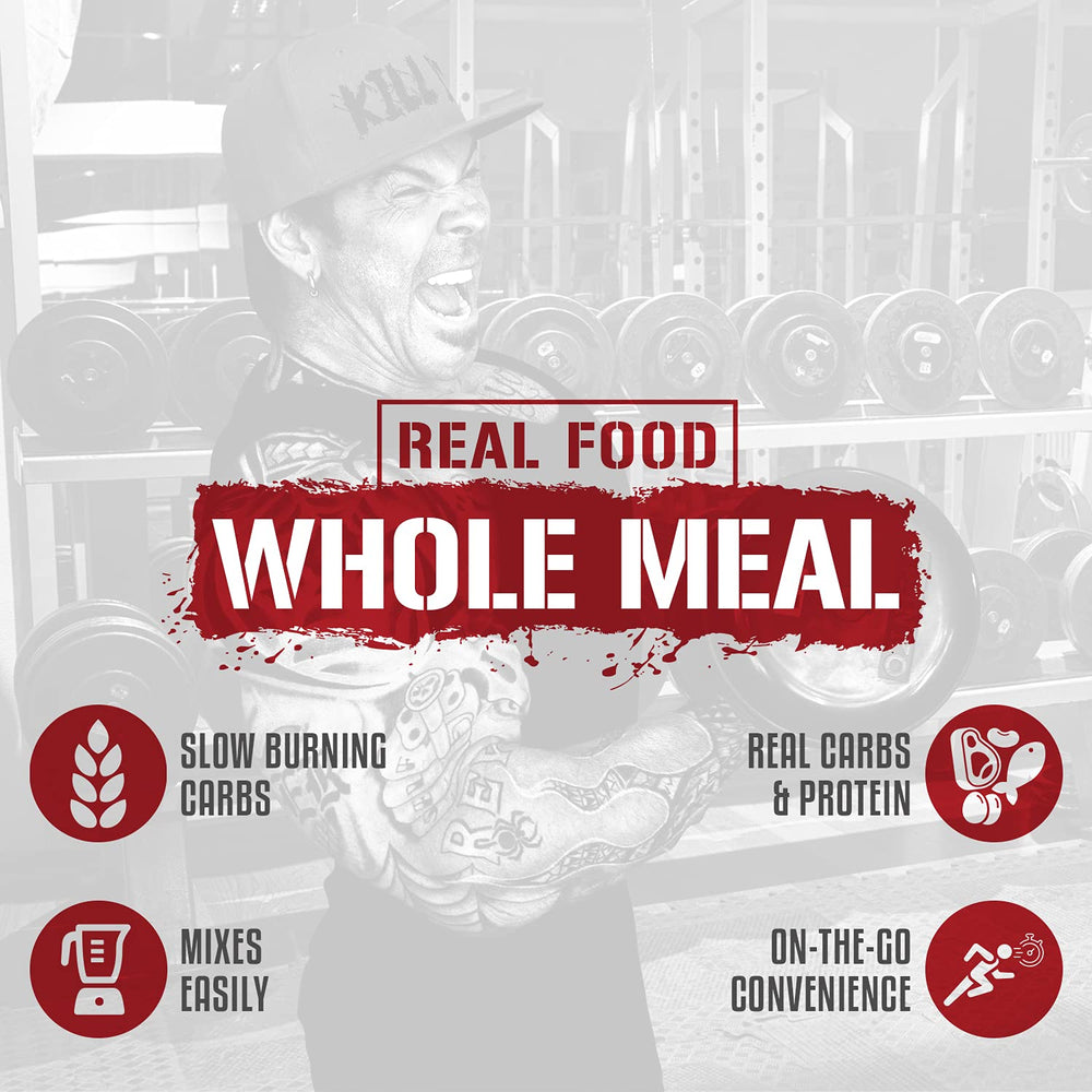 5% Nutrition Rich Piana Real Carbs + Protein shake in glass shows smooth texture and blueberry cobbler flavor.