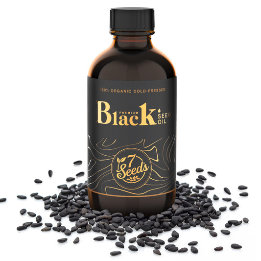 7 Seeds Black Seed Oil amber bottle closeup highlights premium cold-pressed origin