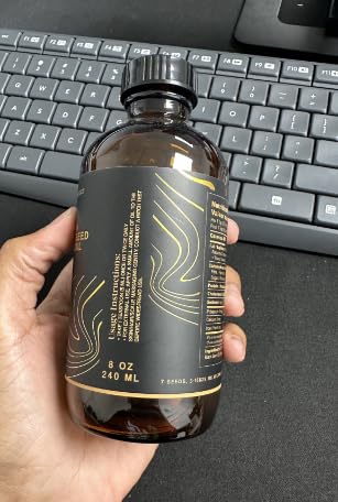 7 Seeds Black Seed Oil label detail and branding closeup