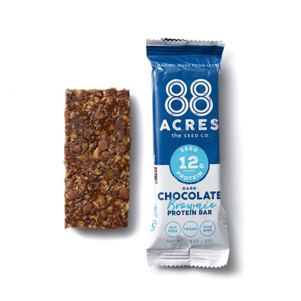88 Acres dark chocolate brownie seed protein bar, allergen-free badge, enjoyed by athletes and vegans.