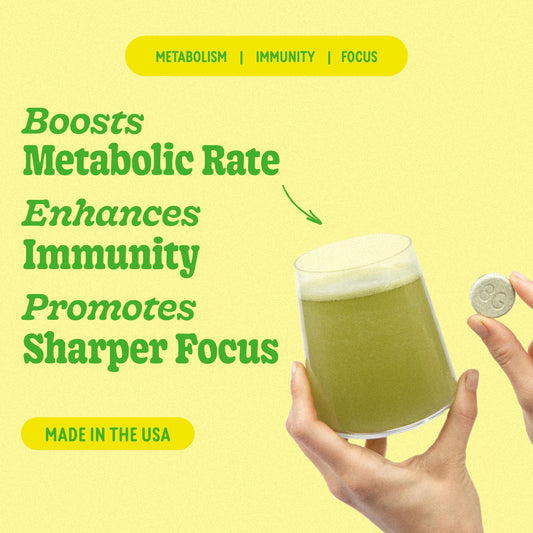8Greens Supergreens tablets being poured into a glass for a quick greens drink.