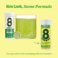 8Greens tablets on a kitchen scene with a glass of prepared drink.