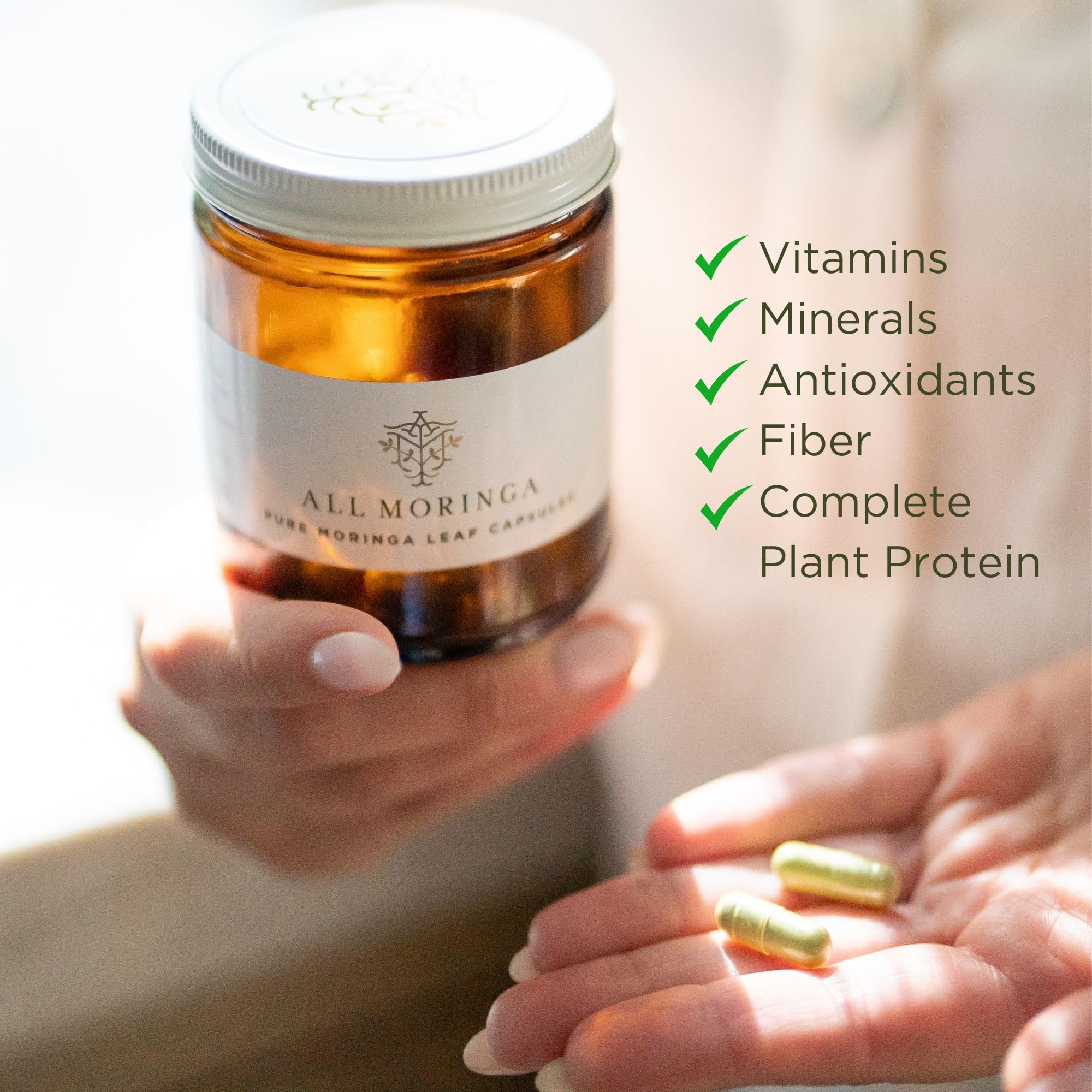 A M Organic Moringa capsules closeup texture highlighting powder purity.