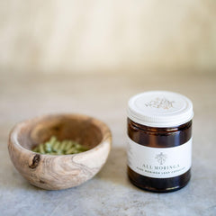 A M Vegan non-GMO label closeup emphasizing clean ingredients.