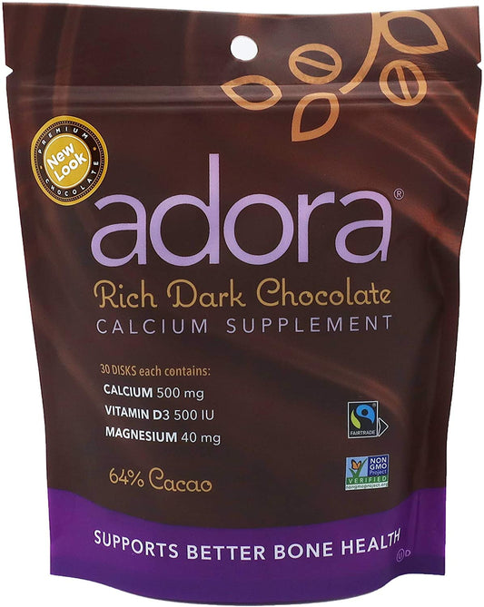 Adora calcium disk in rich dark chocolate close-up, convenient daily supplement.