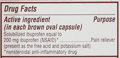 Advil Migraine Liqui-Gels bottle beside a glass for fast, convenient use.