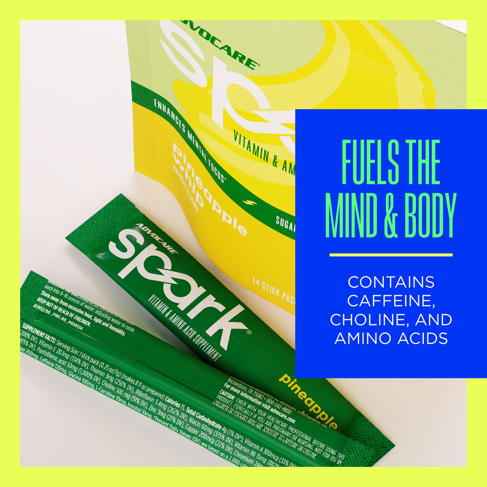 AdvoCare Spark Pineapple Whip mixed drink in a glass with vibrant flavor.