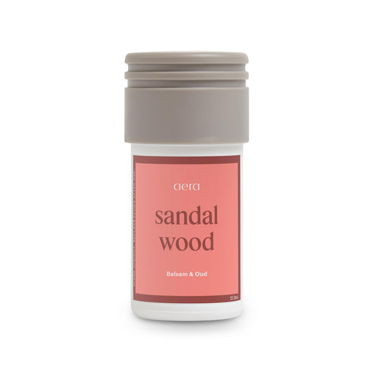 AERA Mini Sandalwood bottle front invites a calming home aroma