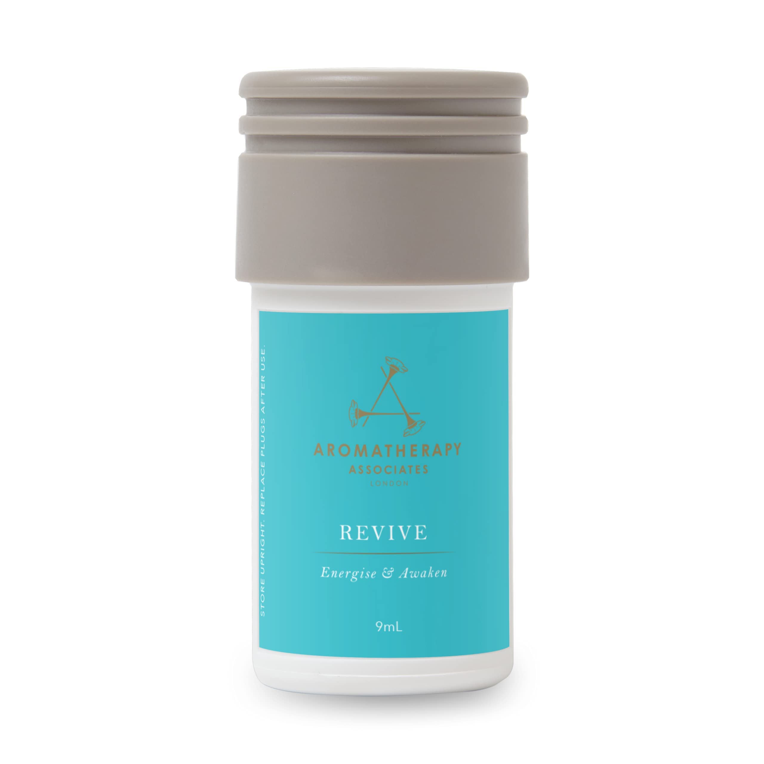 Aera Revive bottle close-up showing juniper berry, rosemary, grapefruit for a refreshing ambiance.