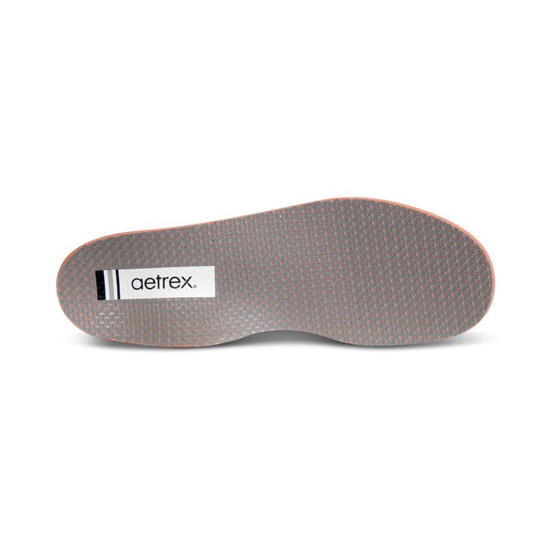 Aetrex AeroCell energy-return insole supports standing and movement.