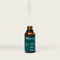 AG1 D3 K2 liquid formula label emphasizes high-potency delivery.
