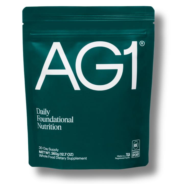 AG1 greens powder refill pouch open showing convenient daily nutrition on the go.