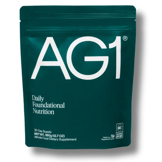 AG1 greens powder refill pouch open showing convenient daily nutrition on the go.