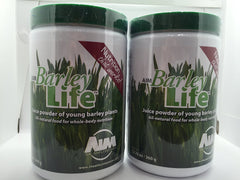 AIM BarleyLife powder label close-up on the family-size canister for daily greens boost.