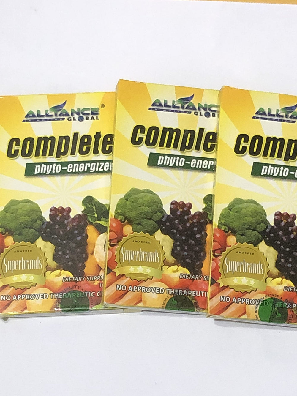 AIM Global Complete Phyto-Energizer bottle label highlights vitamins, minerals, and nutrient ingredients